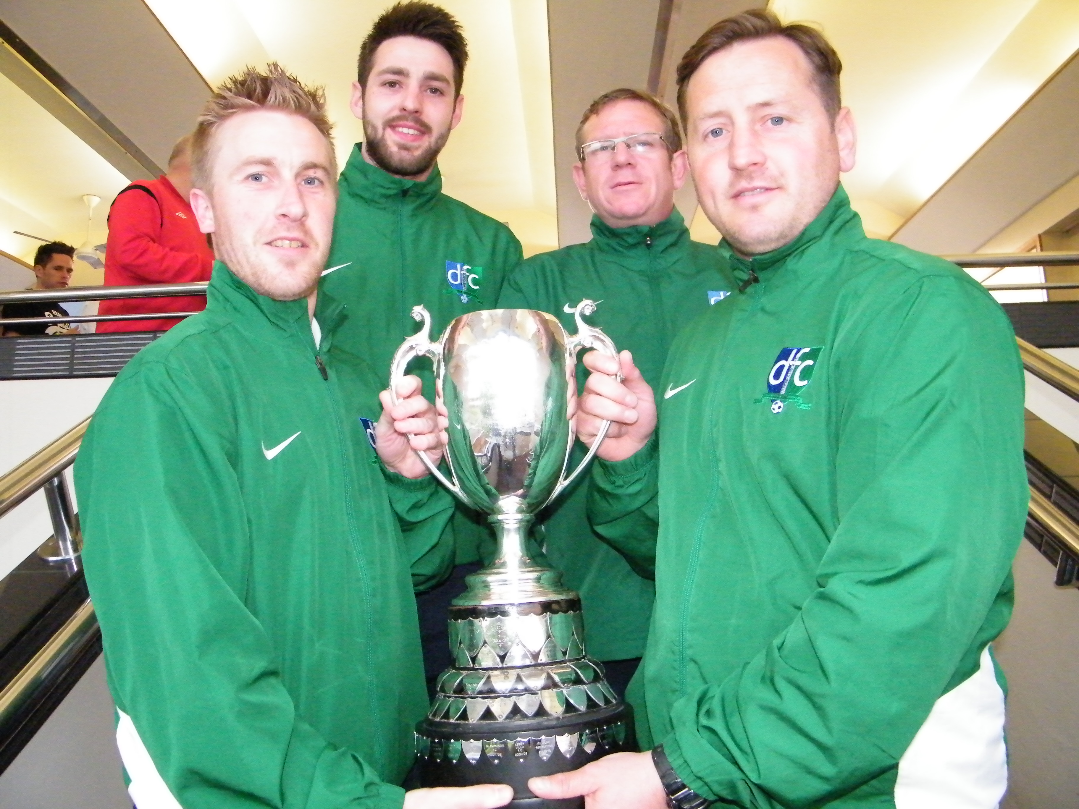 Downpatrick's barry Fitzsimmons,Joe McMahon, Mark Curren & Michael McCreesh with the Division 1A trophy